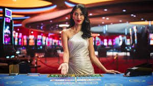 Studio Live Sic Bo mabar 88 dengan dealer profesional dan tiga dadu dalam wadah kaca transparan